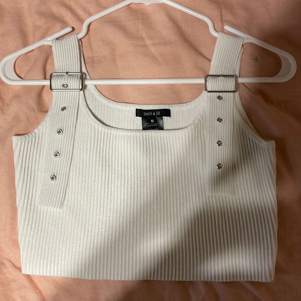 Crop top with buckles that are adjustable